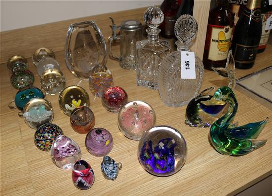 A Kosta glass vase, 17 glass paperweights, 2 decanters and Murano whale